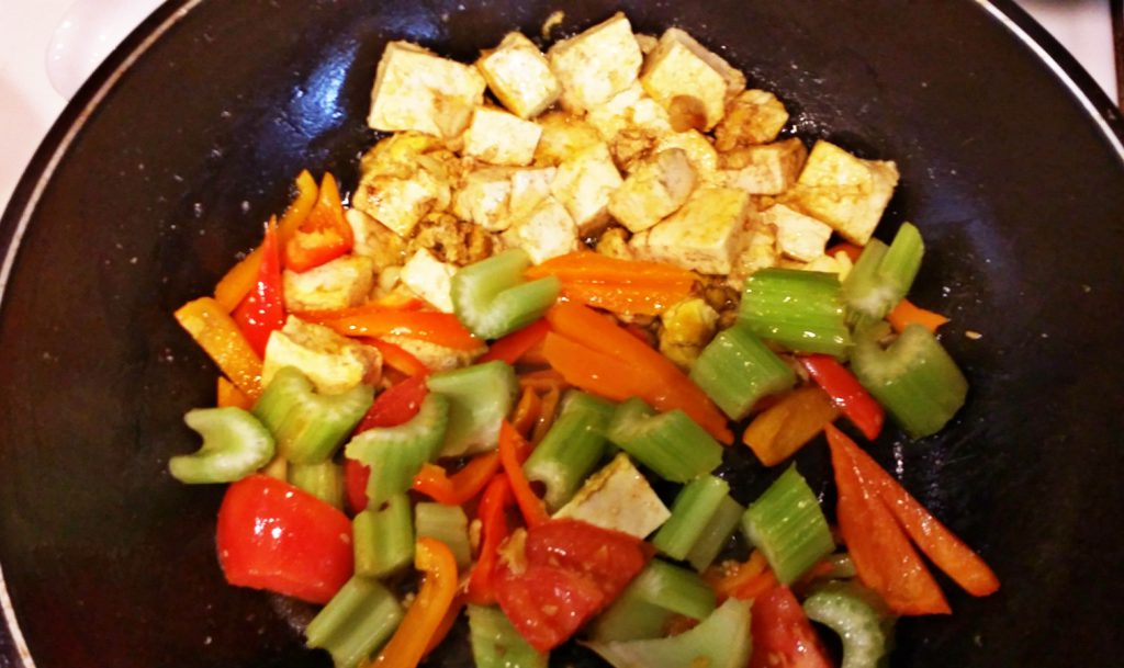 stir frying veggie with egg tofu